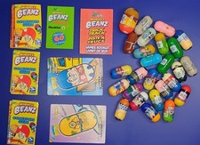 mighty beanz Lot of 27 w/ Collectors Booklets...