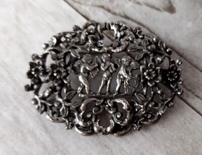 Vintage Brosche aus silberfarbenem Metall von ''Miracle''