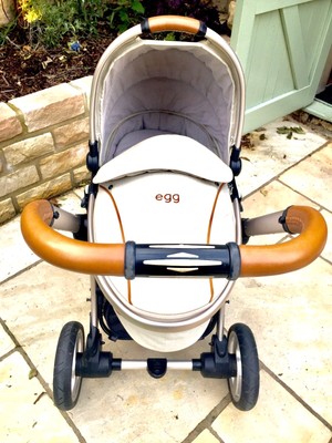 egg pram jurassic cream