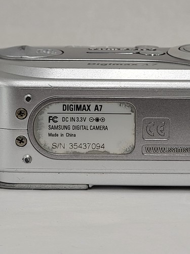 Cámara digital Samsung Digimax A7 7,0 MP plateada probada con cordón cámara de bolsillo - Imagen 10 de 13