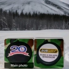 1975-1995 20 YEARS ANNIVERSARY WINDSOR SPITFIRES VINTAGE SUBWAY SPONSOR PUCK +++