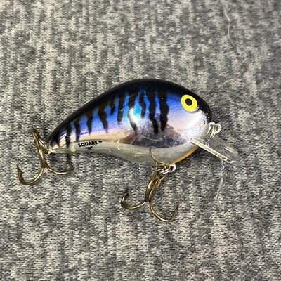 bomber square a fishing lure Long Jerkbait wobbling action as it ricochets off structure Bomber Square A 1/4 oz