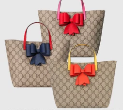 Gucci sac fourre tout ruban enfant motif GG ruban marine poignée rouge occasion objet rare