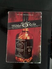motley crue books used some scratches in the cover but perfect inside