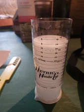 Metric Wonder Cup Two Cup Wet and Dry Adjustable Measuring Cup