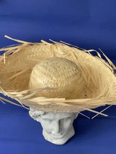 Straw Hat – Great for Halloween Costumes. A spooky scarecrow, creepy farmer