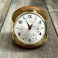 Vintage Westclox Wind Up Travel Alarm Clock US Time Zones Tan Clam Shell Case