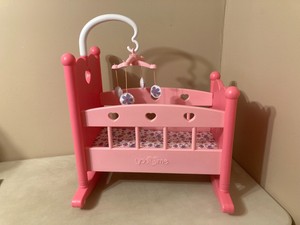 plastic doll cradle