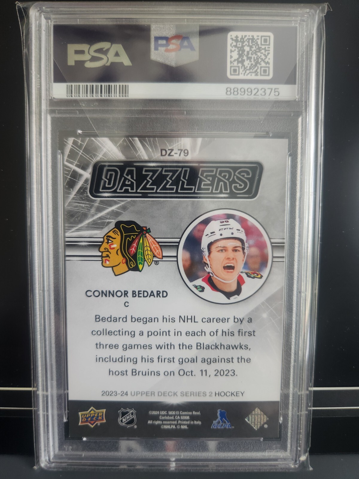 2023 UPPER DECK CONNOR BEDARD ROOKIE DAZZLERS ORANGE #DZ79 PSA 9 Blackhawks view 2