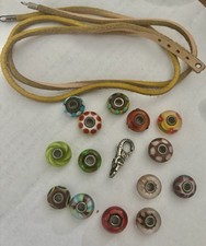 Genuine TrollBeads Collection With Leather Strap And Silver Clasp.