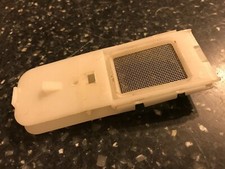 PEG SHAPE MESH FILTER from base of a VAX DUAL V V-124. CARPET WASHER CLEANER