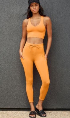 ALO YOGA Women's 7/8 CHECKPOINT Tie Front Leggings Neon Apricot Orange Sz S 