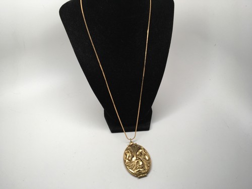 GILDED BRASS REPOUSSE LOCKET PENDANT 
