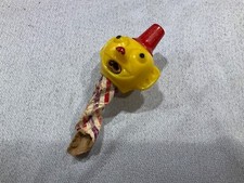 Vintage 1950s plastic clown head noise maker Red Yellow Topper