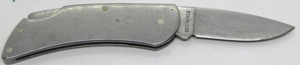 Navaja de bolsillo plegable vintage Zippo de acero inoxidable Quaker State con funda. Foto 2 de 4