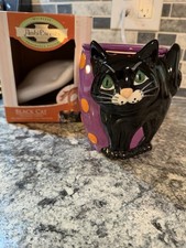 Calentador de cera AmbiEscents gato negro Halloween