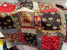 Elementary school theme tied quilt 34.5 x 32 , turquoise backing.