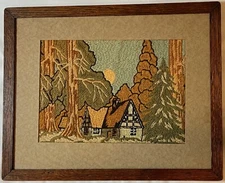 Large Framed Crewel embroidered house-in-woods scene - primitive style