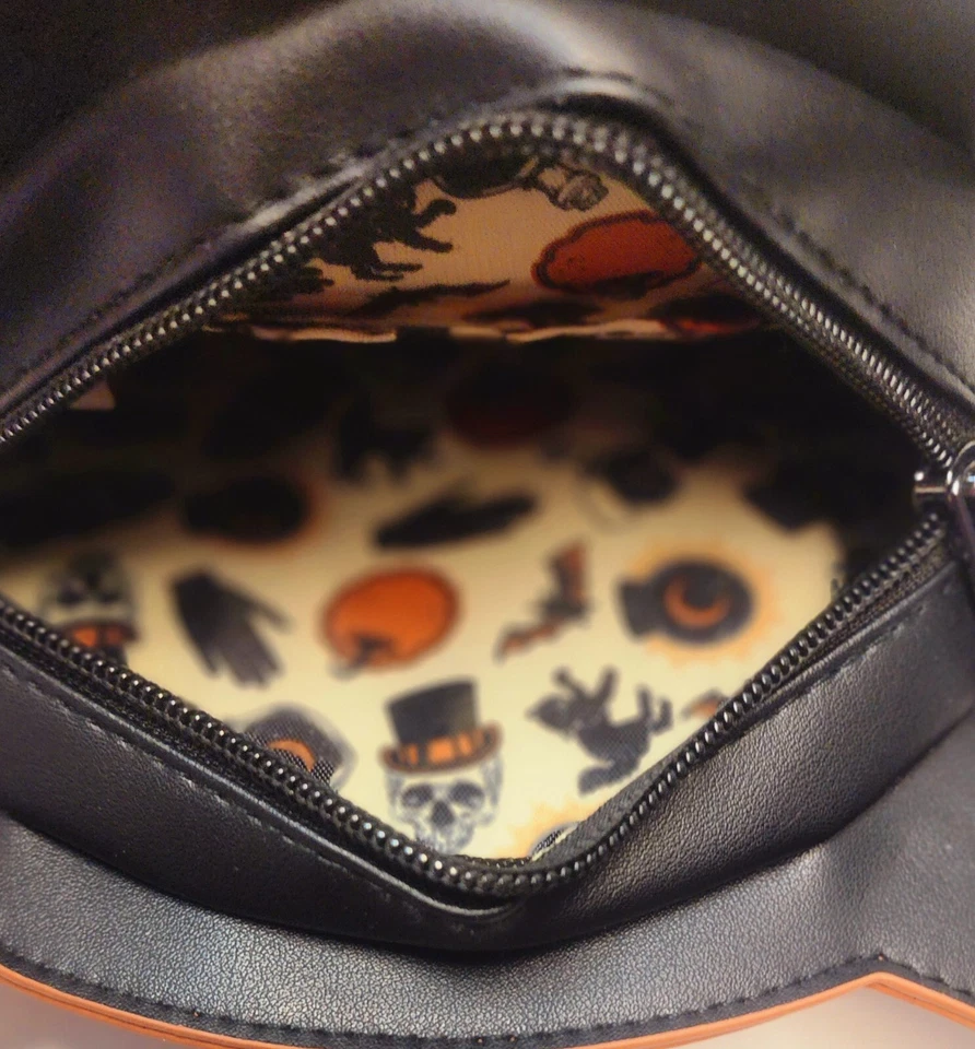 Lindo bolso de gato negro guiñando un ojo cosplay Halloween Foto 3 de 4