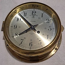 Salem Ship's Bell 8 Day Silent Strike Clock w/key and 23" ship's wheel Vintage