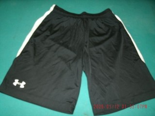 Under Armour Pantaloncini sportivi/allenamento neri/bianchi giovanili larghi larghi