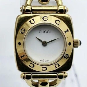 Montre femme GUCCI 6400L ton or quartz pièces à réparer à lire 21 mm