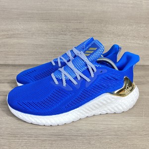blue and gold athletic shoes
