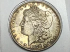 1878 8 TF Morgan Dollar in almost uncirculated plus