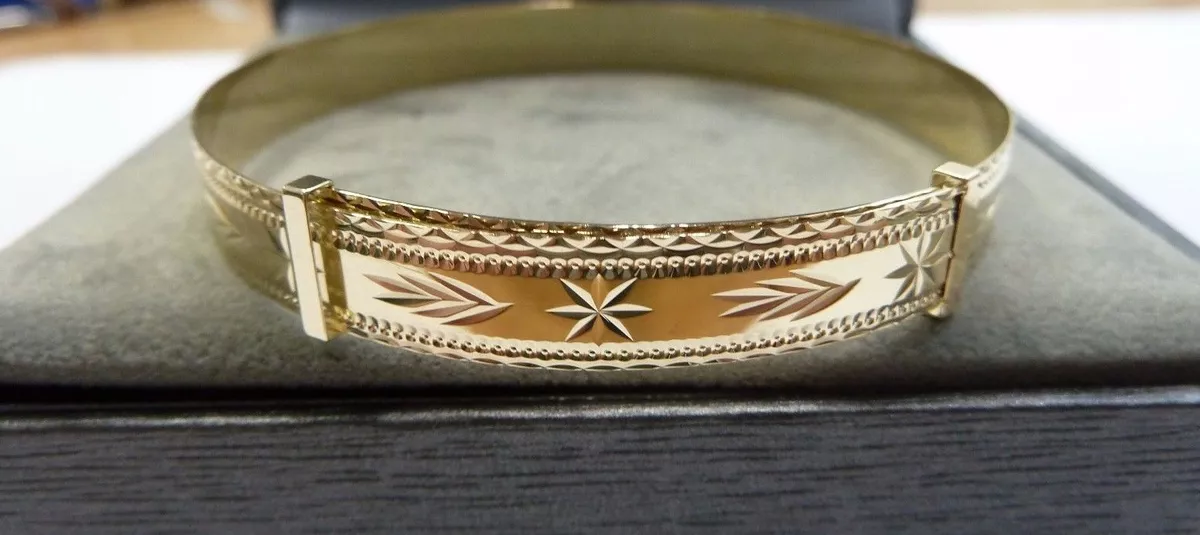 Ladies gold hotsell expanding bangle