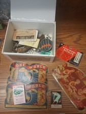 vintage sewing supplies needles metal bobbins colorful needle holders in box