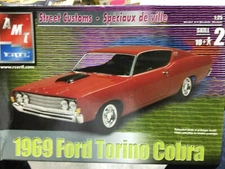 AMT 31745 1969 FORD TORINO COBRA W/NASCAR PARTS 1/25 Model Car Mountain FS