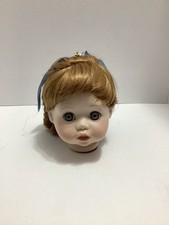 BISQUE PORCELAIN DOLL HEAD RED HAIR BLUE GLASS EYES