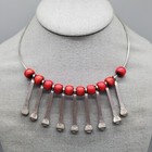 Brutalist Torc Necklace Horseshoe Nail Pendant Spikes Red Wood Bead