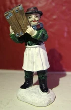 Grandeur Noel Victorian Village Merchant Mustache Man White Apron 2001 Xmas