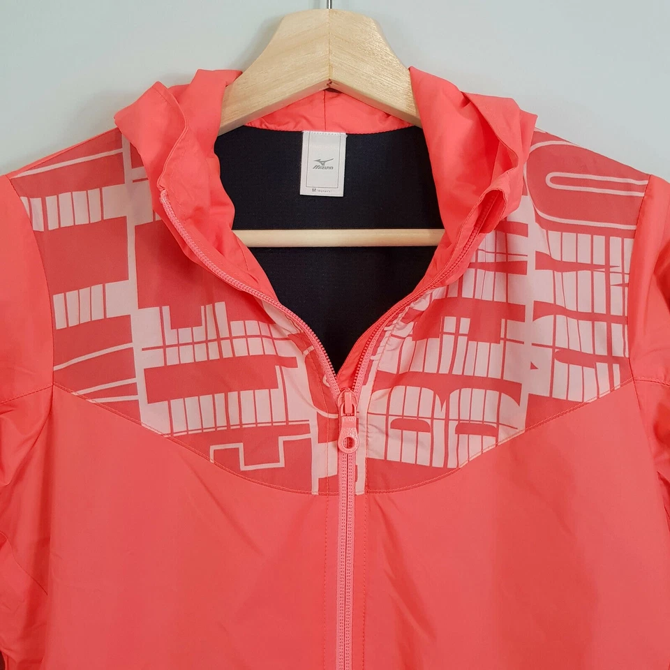 MIZUNO | Chaqueta cortavientos de neón con capucha y cremallera para mujer [Talla M o AU 12] Foto 2 de 4