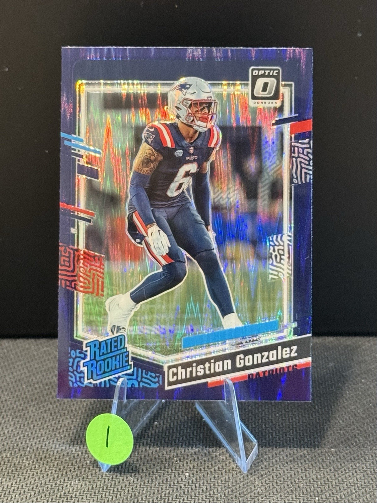 2023 Panini Optic - Rated Rookie Christian Gonzalez #274 Purple Shock Prizm (RC)