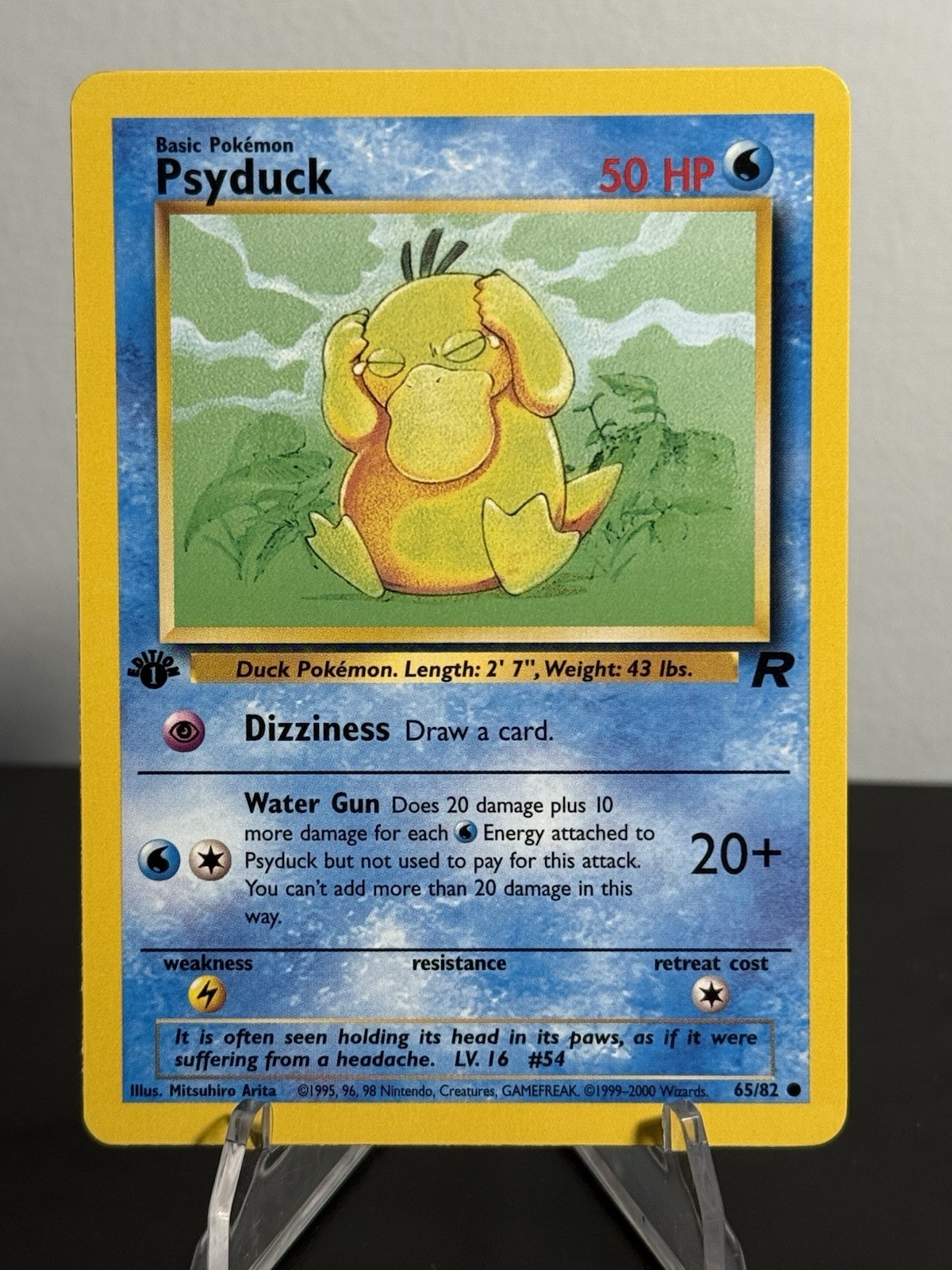 Psyduck 65/82 1st Edition Team Rocket Regular NM