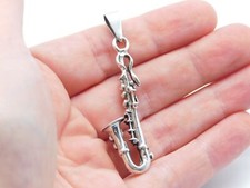 VINTAGE STERLING SILVER FIGURAL SAXOPHONE MUSICAL INSTRUMENT PENDANT