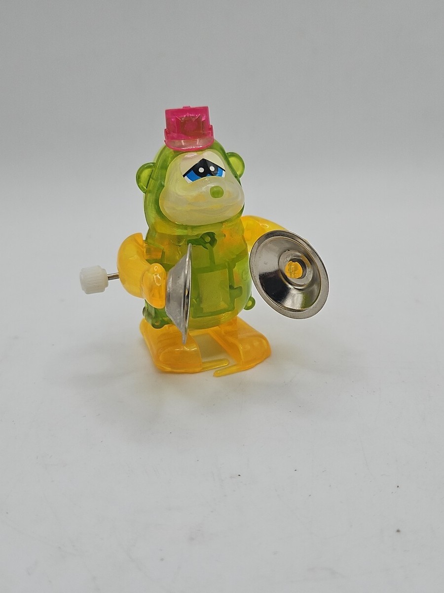 TOMY 2.5” Wind Up Walking Monkey Playing Cymbals Novelty Toy Green