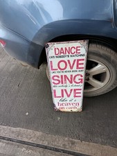 Metal sign. 32 inch long 22 inch wide.