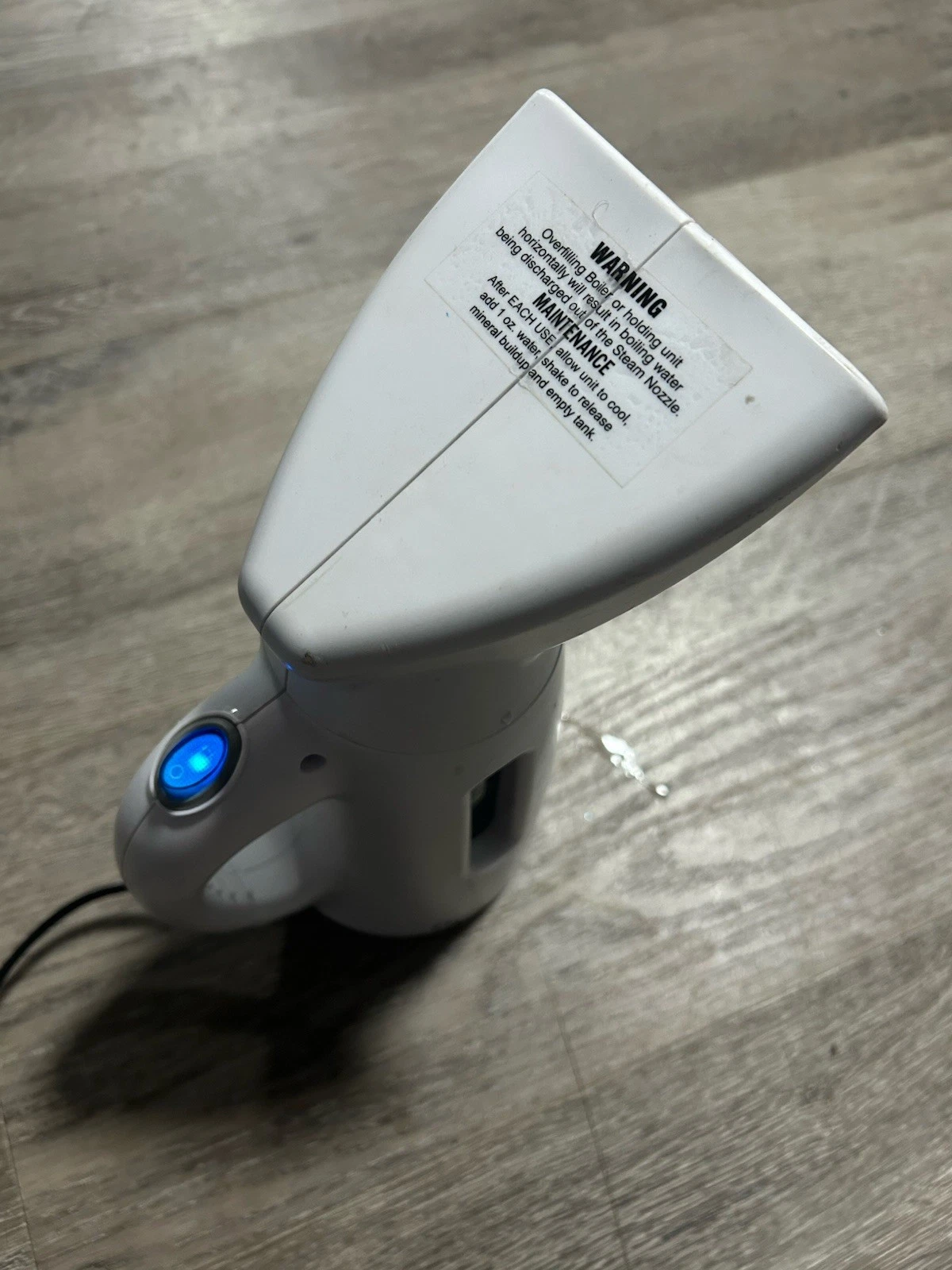 Hand Held Travel Steamer -- Steamfast Compact Travel Garment Steamer