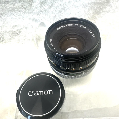 Canon 50mm Camera Lens for FD Mount 50 MM 1:1.8 & Hoya Skylight 1B 55mm & Caps