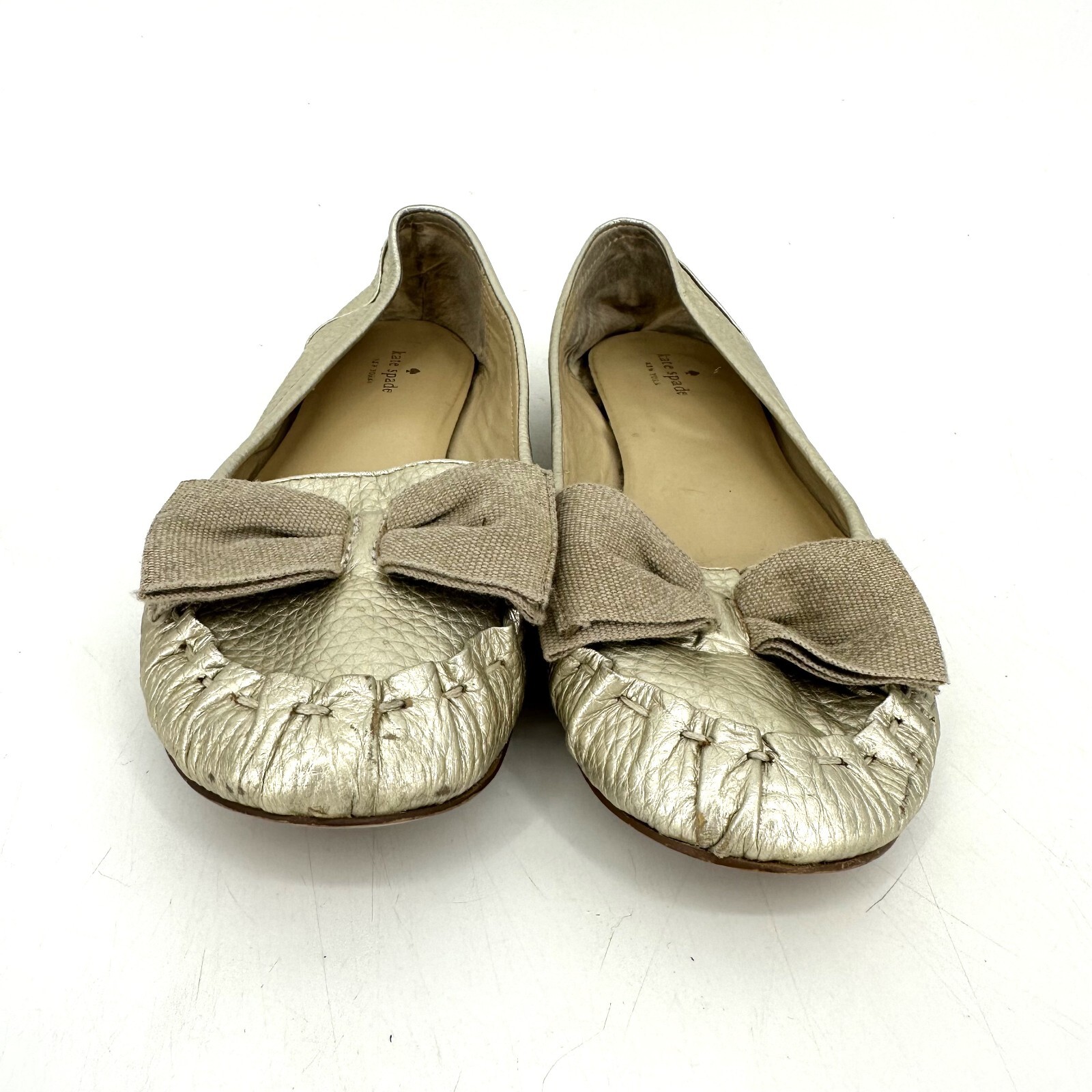 Kate Spade Champagne Gold Leather Moccasin Flats with… Gem