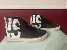 Vans Sk8-Hi Reissue "Classic Tumble" leather high-top sneakers in black an white