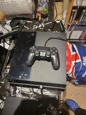 Original PlayStation 4 500GB Black Console + controllers