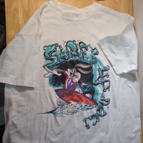 90s USA製 Looney Tunes サーフvintage T-shirt Vintage 90s Looney Tunes Surf Distressed Graphic T Shirt