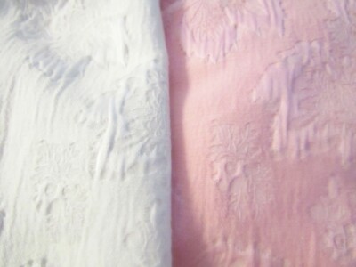 Textured Puckered Embroidered Medium Weight Fabric in Pink or White