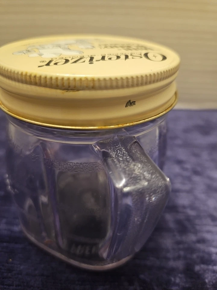 Contenedor de alimentos de plástico y tapa de metal Osterizer Blender & Store para licuadora Oster Foto 3 de 4