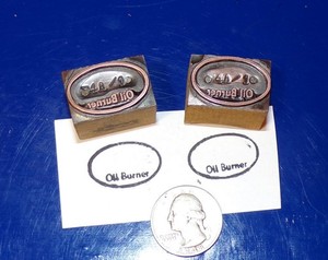 Pair of Small "Oil Burner" Wood and Copper Letterpress / Printers Blocks