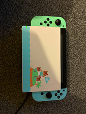 Nintendo Switch Console Bundle w/ Green Joy-Con, Pink Case & Controller Grip